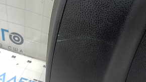 The trunk door trim of a 19-2019 Toyota Highlander is black, with plugs, scratches, and broken fasteners.