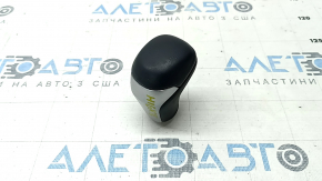 Toyota Highlander 14-19 black leather gear knob with gray insert and scratches on the leather.