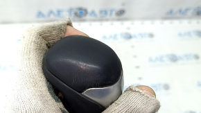 Toyota Highlander 14-19 black leather gear knob with gray insert and scratches on the leather.