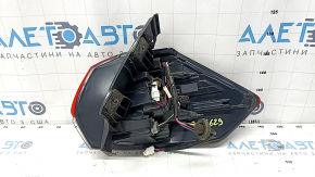 Nissan Rogue 17-20's left outer fender light is worn.