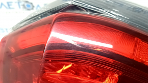 Nissan Rogue 17-20's left outer fender light is worn.