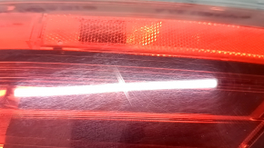 Nissan Rogue 17-20's left outer fender light is worn.