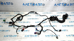 The front right door wiring of a Jeep Cherokee KL 19-19 is broken.