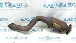 The exhaust pipe, middle section with a catalytic converter, is rusty on a 16-20 Nissan Rogue.