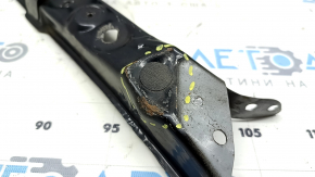 The right eyelash TV bar of a 1920 Nissan Rogue is dented.