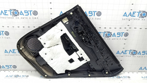 Rear left door panel for a Nissan Rogue 17-20, black with black plastic insert, black leather armrest, graphite molding, with handle, scratches, needs cleaning