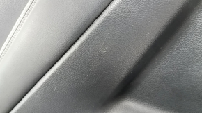 Rear left door panel for a Nissan Rogue 17-20, black with black plastic insert, black leather armrest, graphite molding, with handle, scratches, needs cleaning