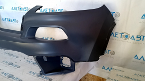 The front bumper is bare, the upper part of the Jeep Cherokee KL 14-14 without parking sensors, under the towing hook plug, dented