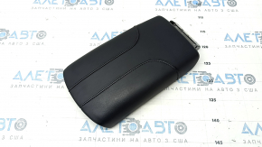 Nissan Rogue 17-20 leather armrest, black, plastic turned white, broken mount