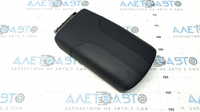 Nissan Rogue 17-20 leather armrest, black, plastic turned white, broken mount
