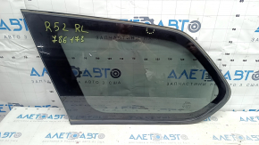 Rear left Nissan Pathfinder 13-20 window with scratches on the glass.