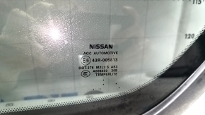Rear left Nissan Pathfinder 13-20 window with scratches on the glass.