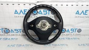 The steering wheel is bare, BMW 3 F30 12-18, black leather, Sport, with paddle shifters, without heating, with a tear and scratches.