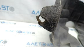 The rear right fender liner for a Honda CRV 17-22 under R18 has a torn mount.