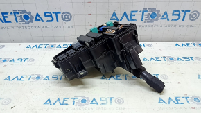 The Honda Insight 19-22 underhood fuse box is large, missing a cover and wiring, and the latch is broken.