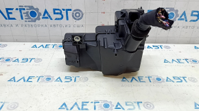 The Honda Insight 19-22 underhood fuse box is large, missing a cover and wiring, and the latch is broken.