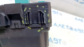 The Honda Insight 19-22 underhood fuse box is large, missing a cover and wiring, and the latch is broken.