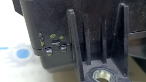 The Honda Insight 19-22 underhood fuse box is large, missing a cover and wiring, and the latch is broken.