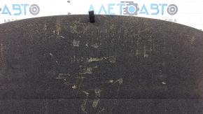 The trunk floor of a Honda CRV 20-22 hybrid is black and needs dry cleaning. The insulation is torn.