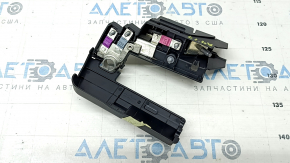 The positive terminal of the Audi A4 B9 17-25 battery with a squib, the cover fastener is broken