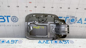 The fuel filler door of the Honda Insight 19-22 is dented.