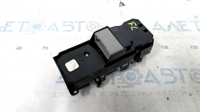 The front left window lift control button on a 19-22 Honda Insight is worn out.