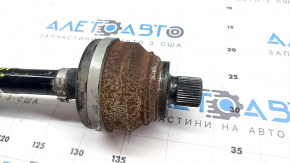 The rear left half-shaft of a Volkswagen ID.4 23-25 is rusty.