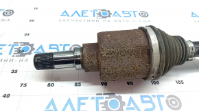 The rear left half-shaft of a Volkswagen ID.4 23-25 is rusty.