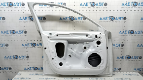 Bare front left door for an Audi A4 B9 17-18 with a door stop, white LY9C, dented corner, scuffed, bump, dent
