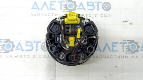 The Audi A4 B9 17-25 steering wheel airbag, black, scratched.