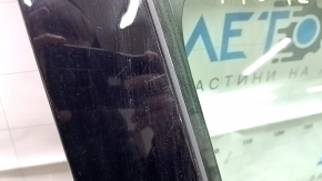 Front right door assembly for a VW Tiguan 09-18 keyless, graphite LD7P, painted, nicks, scratches on the trim