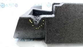 The left trunk tray foam is torn on a VW Tiguan 09-18.