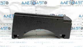 The right trunk tray foam is torn on a VW Tiguan 09-18.