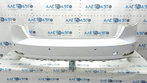 Bare rear bumper for Audi A4 B9 17-19 with 4 parking sensors, white, with central mount, without plug, broken mounts, pressed