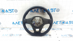 The steering wheel is bare, Volkswagen ID.4 23-25, black leather, heated, with scuffs.