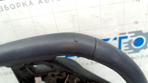 The steering wheel is bare, Volkswagen ID.4 23-25, black leather, heated, with scuffs.