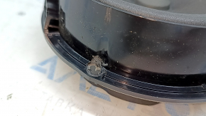 The rear right speaker of a VW Tiguan 12-18 has a broken mount.