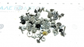 Incomplete set of hardware for the bumper and hood of a Mercedes W213 E 17-23
