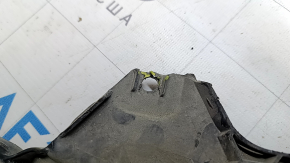 The right front bumper guard for a Volkswagen ID.4 21-22 is worn and the fasteners are torn.
