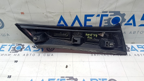 Left trunk door molding along the glass of a Chevrolet Bolt 17-21, black gloss, scratch