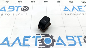 The trunk lid release button on the Audi Q3 8U 15-18 dashboard