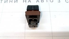 The trunk lid release button on the Audi Q3 8U 15-18 dashboard