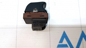 The trunk lid release button on the Audi Q3 8U 15-18 dashboard
