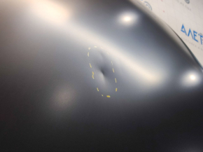 The hood of a bare Audi A4 B8 13-16 restyling steel, dented