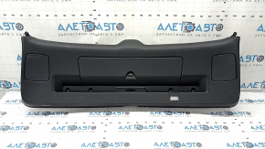 The lower trim of the tailgate of the Audi Q7 4L 10-15 is black, with plugs, without a curtain, worn, scratches