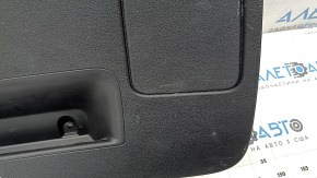 The lower trim of the tailgate of the Audi Q7 4L 10-15 is black, with plugs, without a curtain, worn, scratches