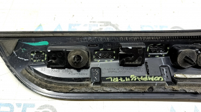 Left side window molding for a Jeep Compass 17-24, gloss black, defective fasteners, scratches