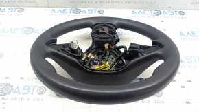 The steering wheel is bare, Chevrolet Bolt 17, black rubber, heated, without buttons and paddles, burnt.