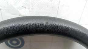 The steering wheel is bare, Chevrolet Bolt 17, black rubber, heated, without buttons and paddles, burnt.