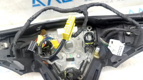 The steering wheel is bare, Chevrolet Bolt 17, black rubber, heated, without buttons and paddles, burnt.